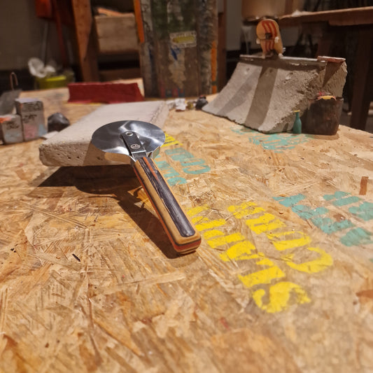 Pizzaslicer Av Återvunna Skateboards